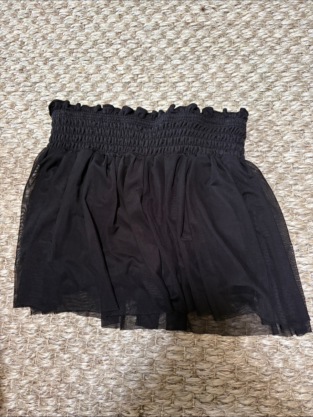 Black shorts with mesh skirt overlay